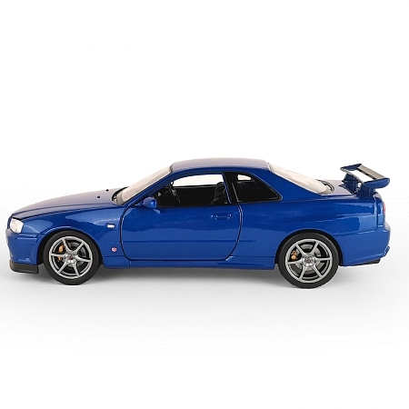 Картинка Welly Машинка металлическая 1:24 Nissan Skyline GT-R R34, синяя магазин gnom.land Картинка Welly Машинка металлическая 1:24 Nissan Skyline GT-R R34, синяя магазин gnom.land