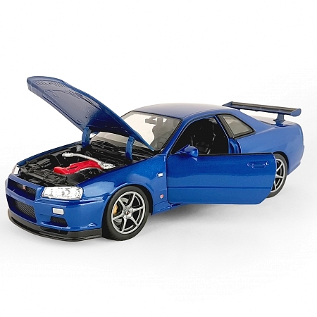 Картинка Welly Машинка металлическая 1:24 Nissan Skyline GT-R R34, синяя магазин gnom.land Картинка Welly Машинка металлическая 1:24 Nissan Skyline GT-R R34, синяя магазин gnom.land